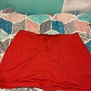 Red skirt with shorts underneath.